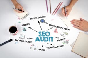 Website SEO Audit Concept. The meeting at the white office table.